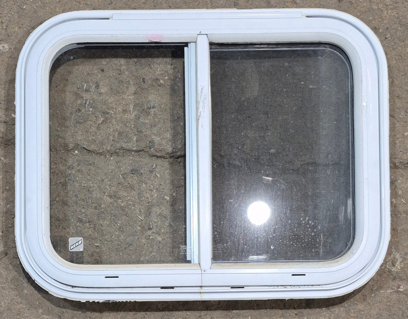 Used White Radius Emergency Opening Window : 25 1/2" W x 19 1/2" H x 1 1/4" D - Young Farts RV Parts