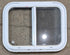 Used White Radius Emergency Opening Window : 25 1/2" W x 19 1/2" H x 1 1/4" D - Young Farts RV Parts