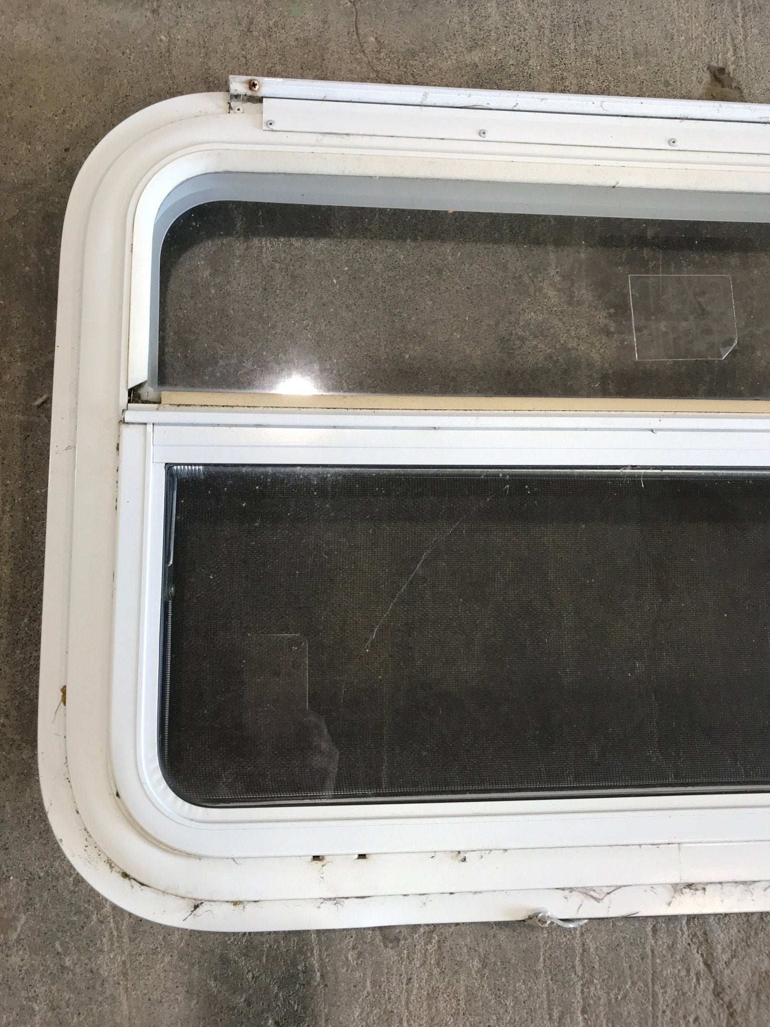 Used White Radius Emergency Opening Window : 29 1/4" W x 19 1/2" H x 1 1/2" D - Young Farts RV Parts