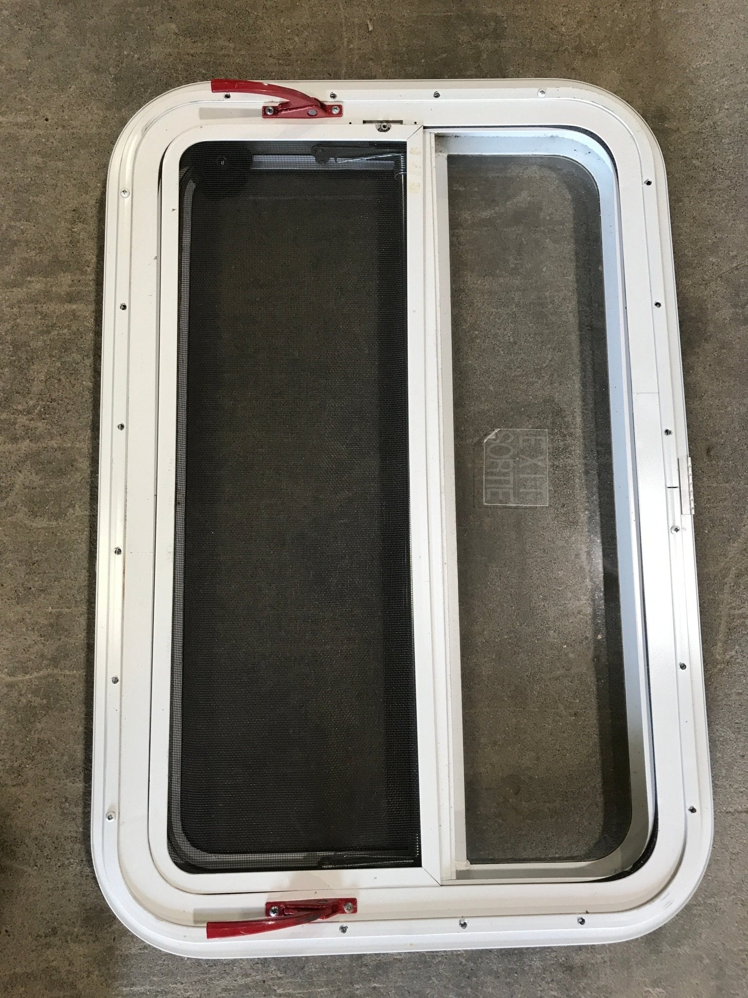 Used White Radius Emergency Opening Window : 29 1/4" W x 19 1/2" H x 1 1/2" D - Young Farts RV Parts