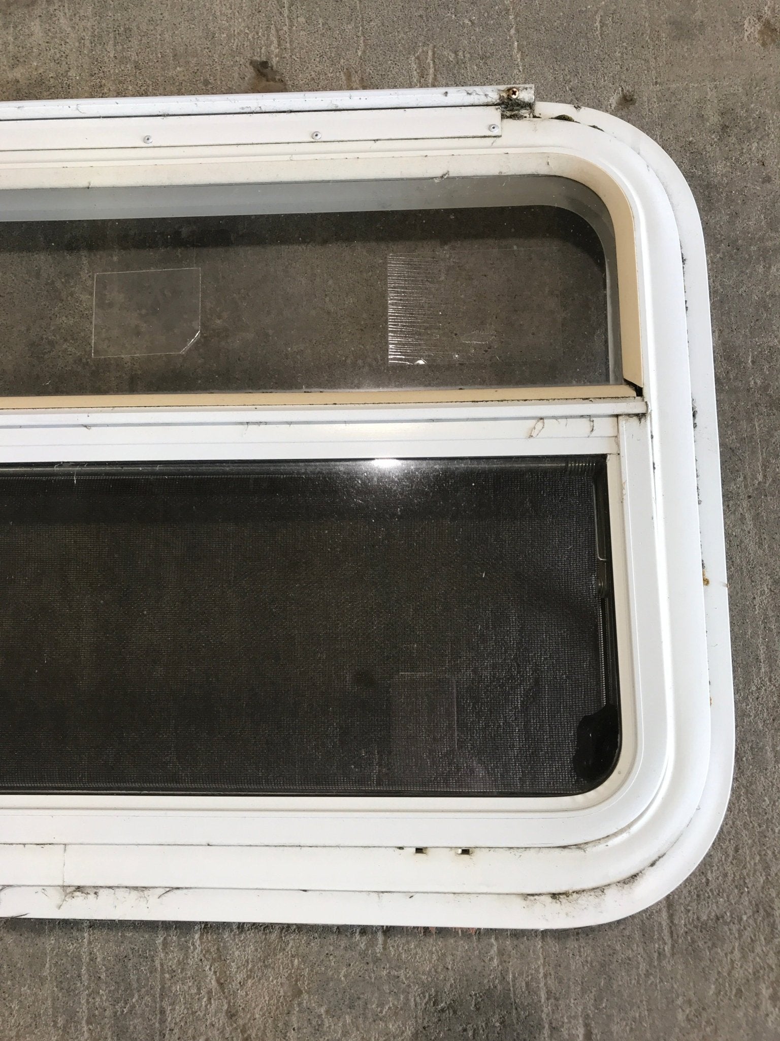 Used White Radius Emergency Opening Window : 29 1/4" W x 19 1/2" H x 1 1/2" D - Young Farts RV Parts