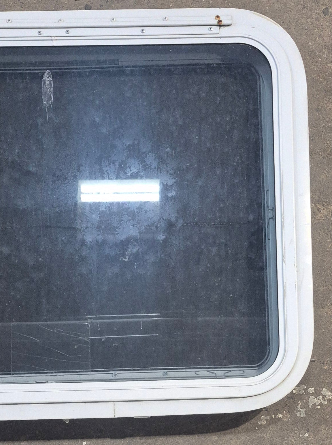 Used White Radius Emergency Opening Window : 29 1/4" W x 21 1/4" H x 1 7/8" D - Young Farts RV Parts