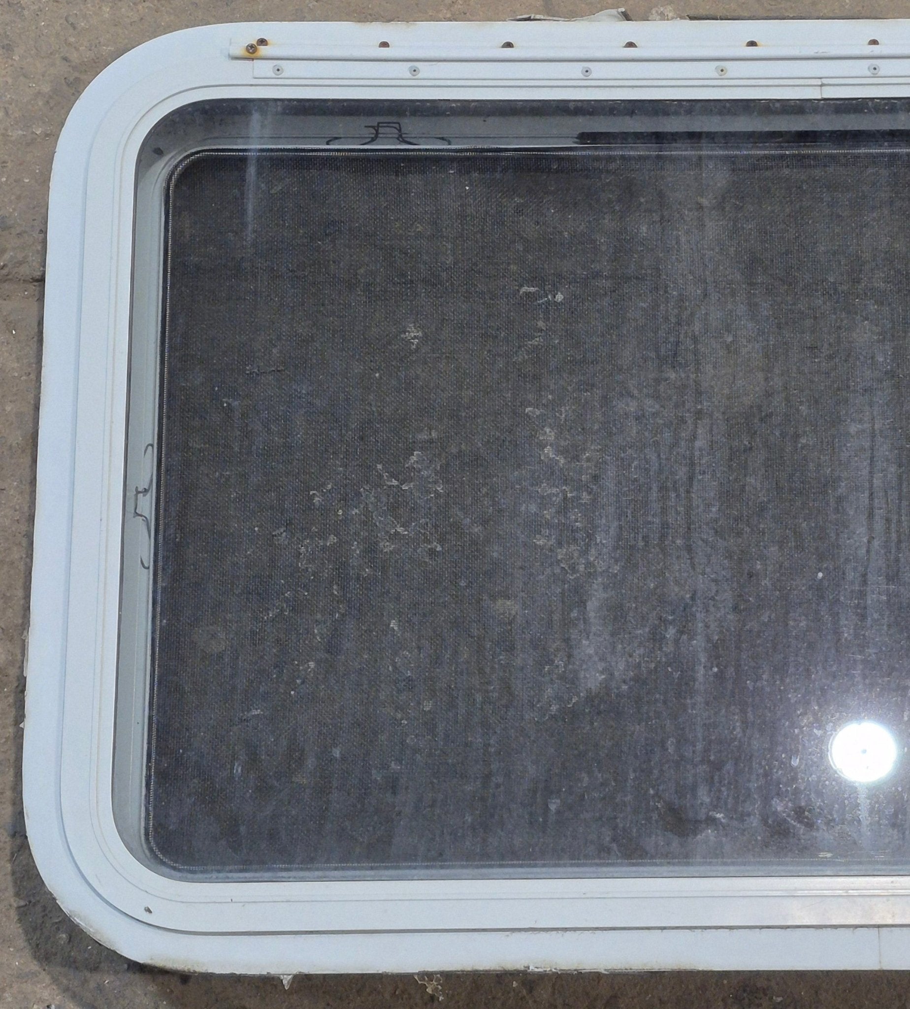 Used White Radius Emergency Opening Window : 35 1/4" W x 21 1/4" H x 1 7/8" D - Young Farts RV Parts