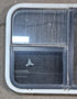 Used White Radius Emergency Opening Window : 41 1/4" W x 21 1/4" H x 1 3/4" D - Young Farts RV Parts