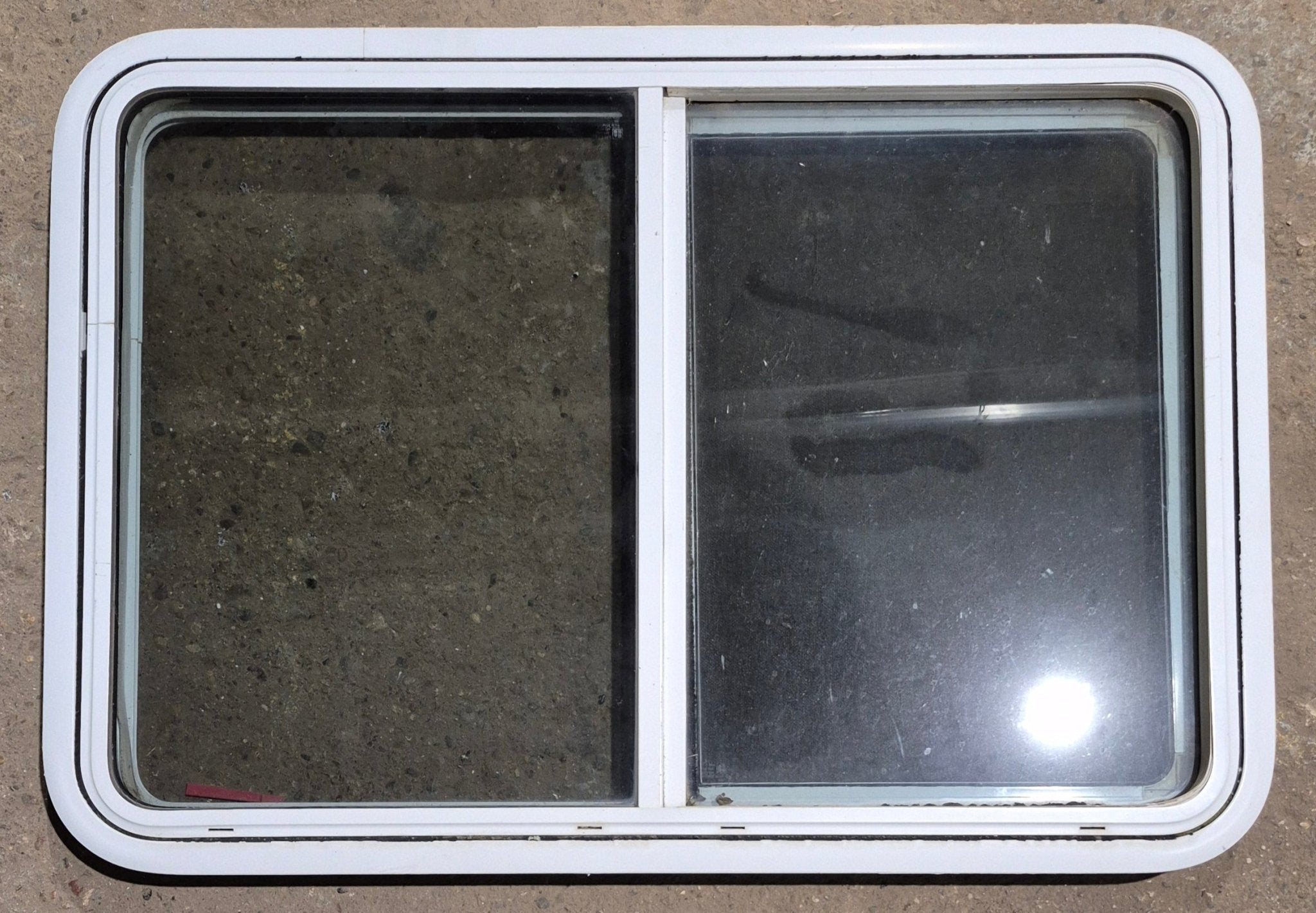 Used White Radius Emergency Opening Window : 41 1/4" W x 28 1/2" H x 2" D - Young Farts RV Parts