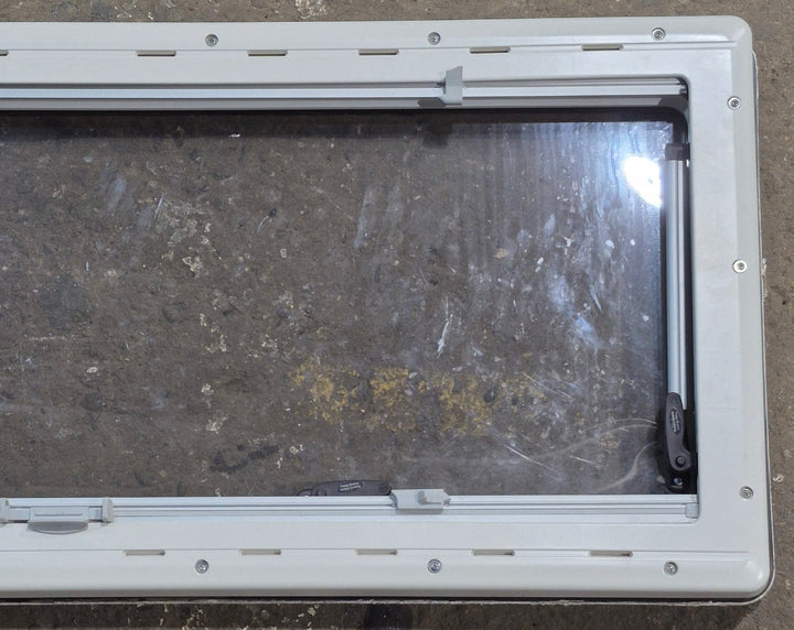 Used White Radius Emergency Opening Window : 46 5/8" W x 18 3/4" H x 1 1/8" D - Young Farts RV Parts