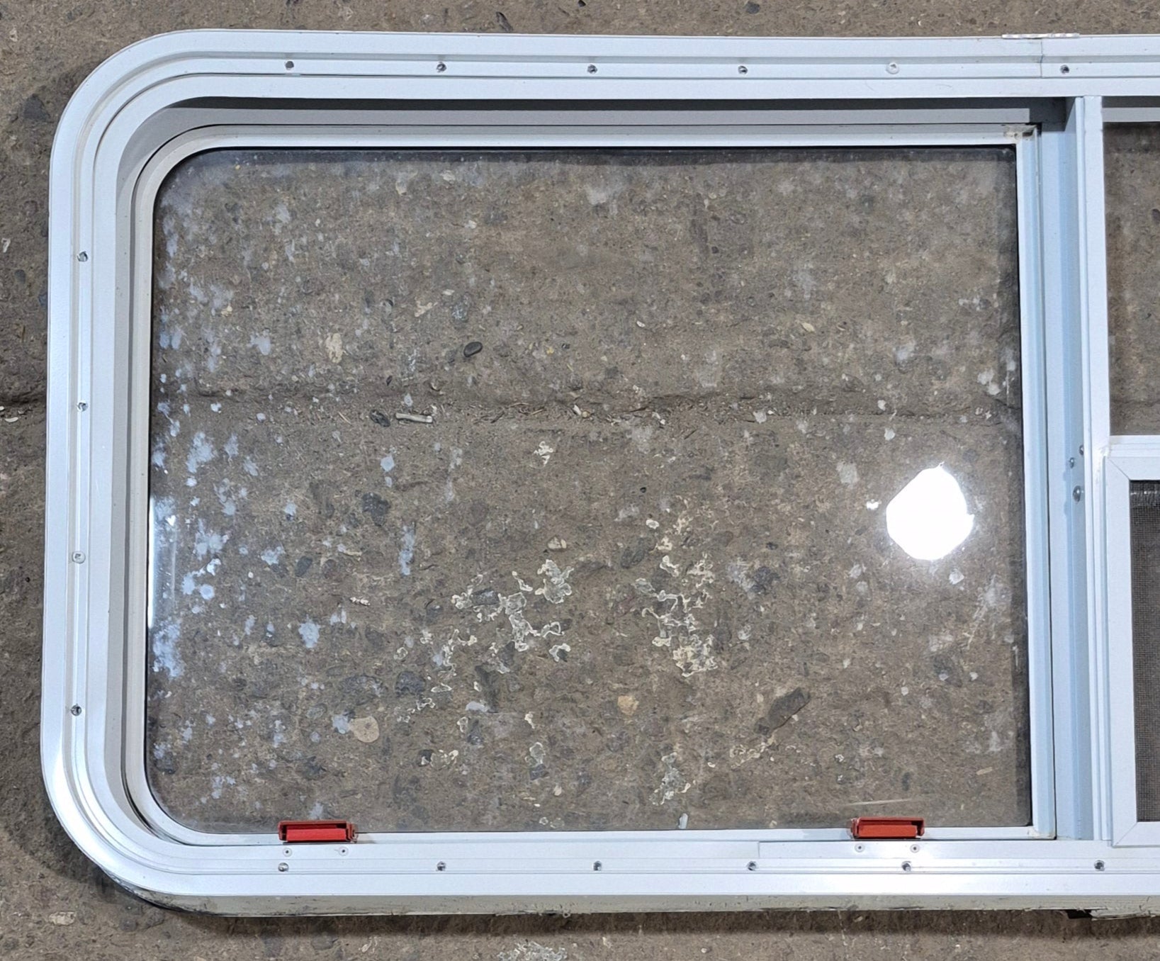 Used White Radius Emergency Opening Window : 47 1/2" W x 21 1/4" H x 2" D - Young Farts RV Parts
