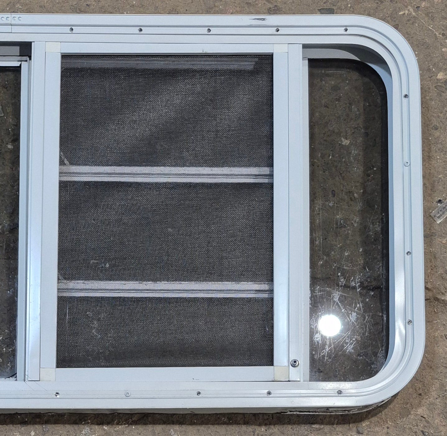 Used White Radius Emergency Opening Window : 47 1/4" W x 21 1/4" H x 1 7/8" D - Young Farts RV Parts