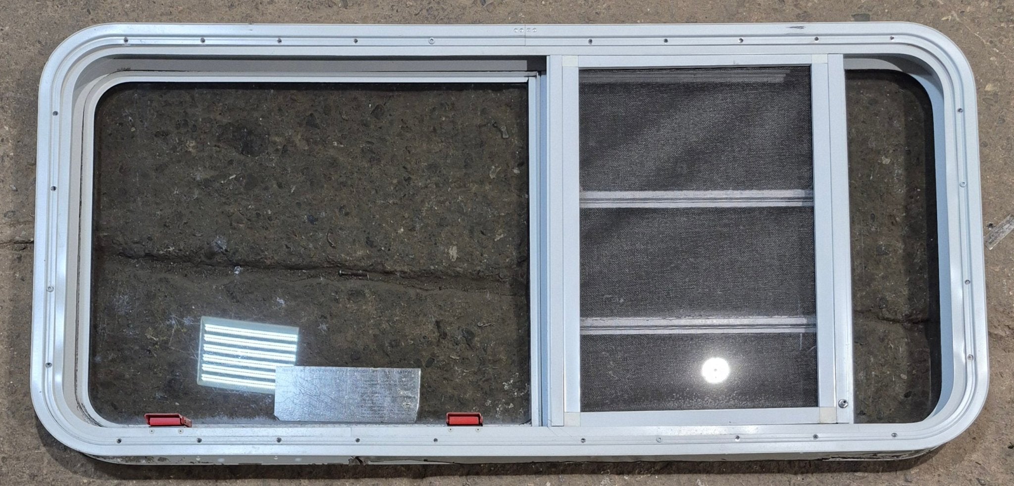 Used White Radius Emergency Opening Window : 47 1/4" W x 21 1/4" H x 1 7/8" D - Young Farts RV Parts