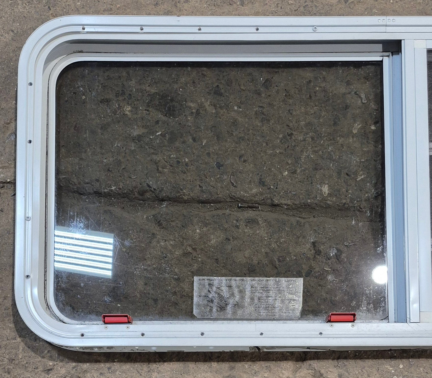 Used White Radius Emergency Opening Window : 47 1/4" W x 21 1/4" H x 1 7/8" D - Young Farts RV Parts