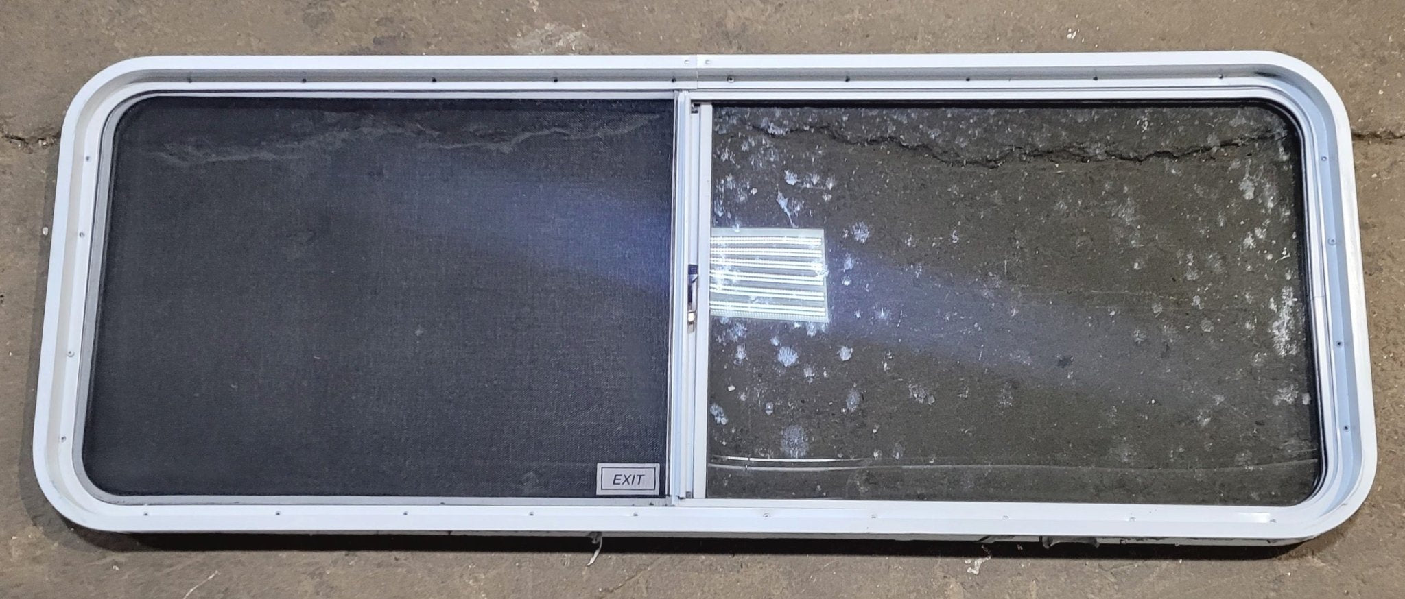 Used White Radius Emergency Opening Window : 60 1/4" W x 21 3/4" H x 1 7/8" D - Young Farts RV Parts