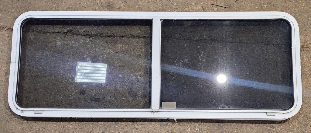 Used White Radius Emergency Opening Window : 60 1/4" W x 21 3/4" H x 1 7/8" D - Young Farts RV Parts