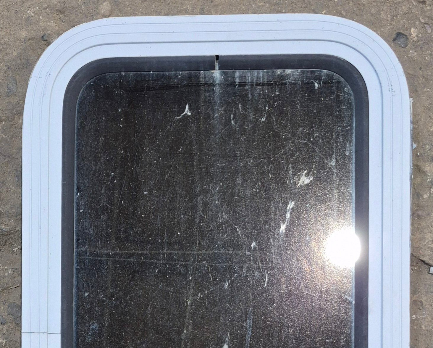 Used White Radius Non Opening Window : 13 1/2" W x 23 1/2" H x 1 7/8" D - Young Farts RV Parts