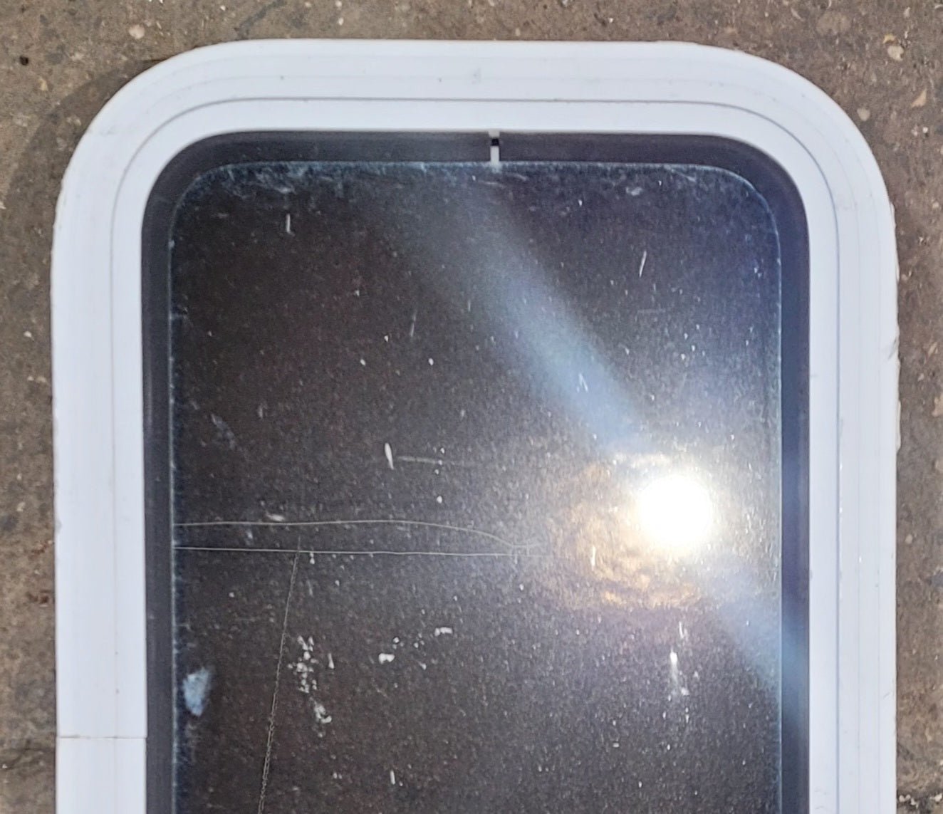 Used White Radius Non Opening Window : 13 1/2" W x 23 1/2" H x 1 7/8" D - Young Farts RV Parts