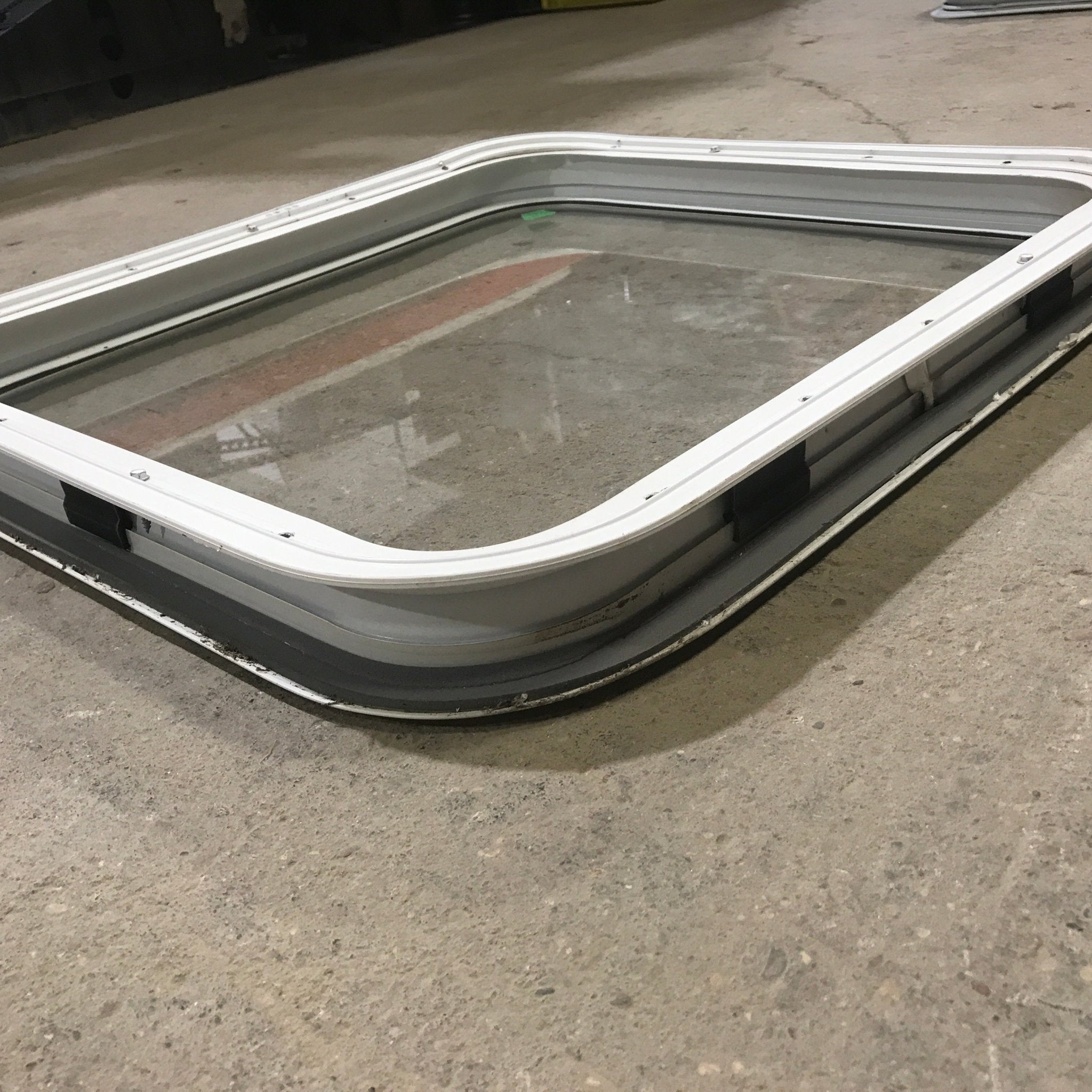 Used White Radius Non Opening Window : 23 1/2" W x 21 1/2" H x 1 7/8" D - Young Farts RV Parts