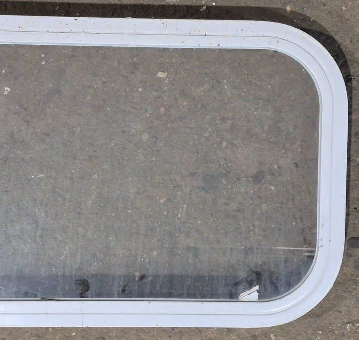 Used White Radius Non Opening Window : 23 3/4" W x 13 3/4" H x 1 7/8" D - Young Farts RV Parts