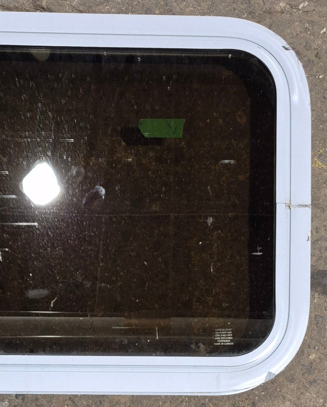 Used White Radius Non Opening Window : 24 1/4" W x 16 3/4" H x 1 7/8" D - Young Farts RV Parts