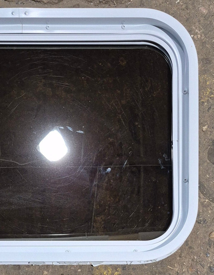 Used White Radius Non Opening Window : 24 1/4" W x 16 3/4" H x 1 7/8" D - Young Farts RV Parts