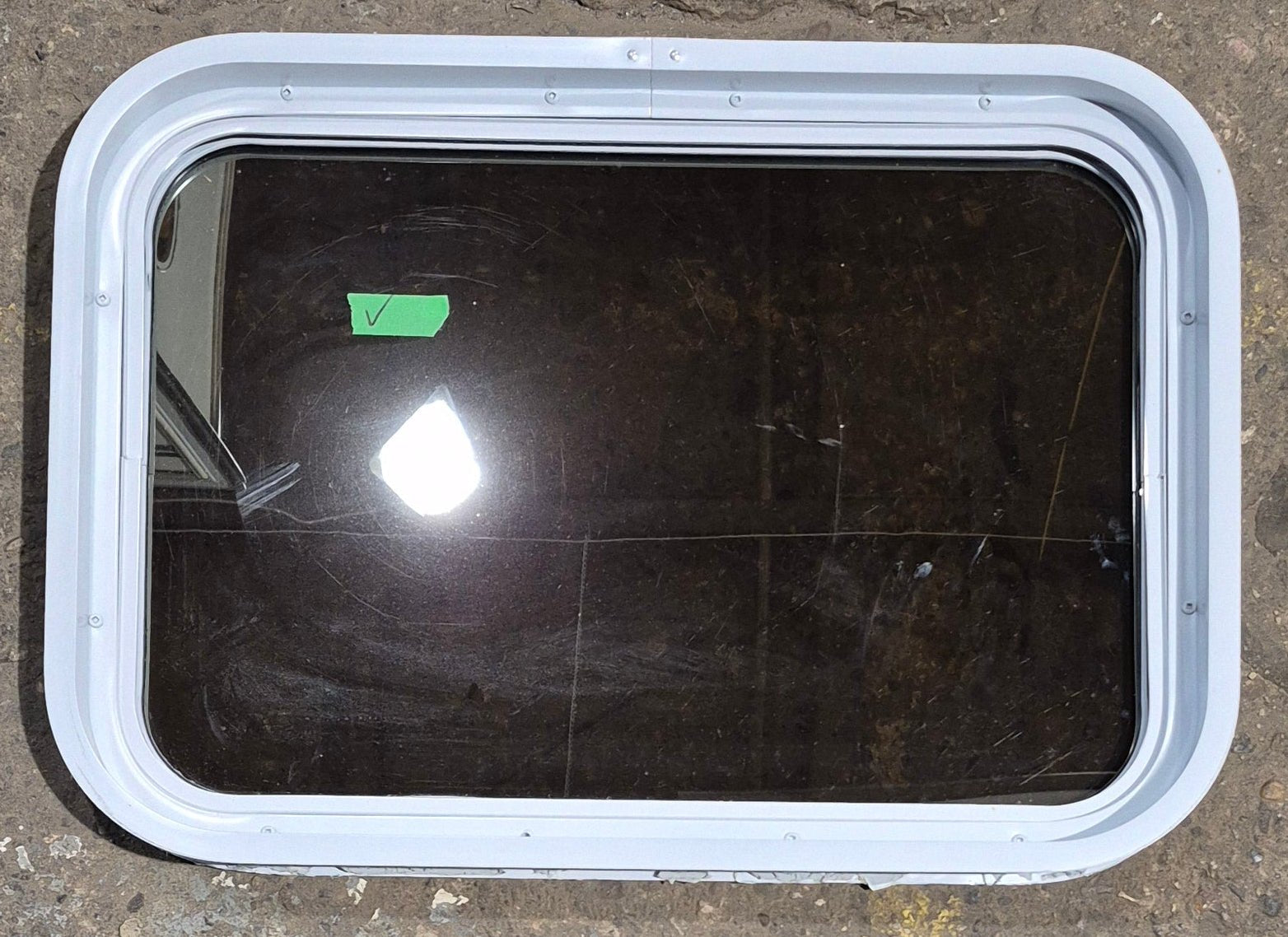 Used White Radius Non Opening Window : 24 1/4" W x 16 3/4" H x 1 7/8" D - Young Farts RV Parts
