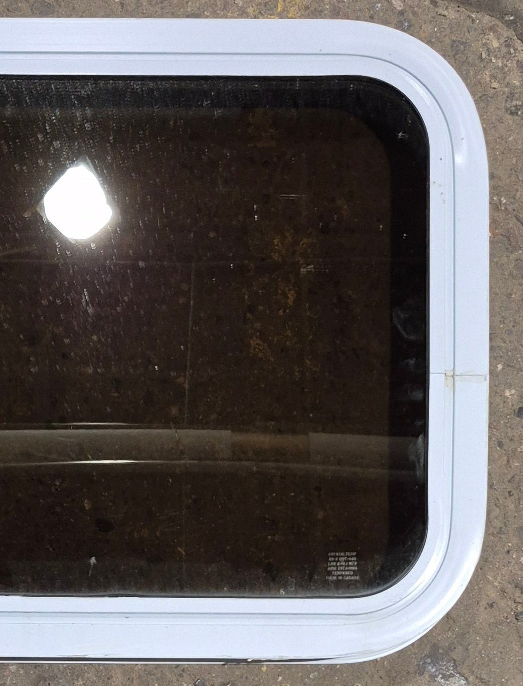 Used White Radius Non Opening Window : 24 1/4" W x 16 3/4" H x 1 7/8" D - Young Farts RV Parts