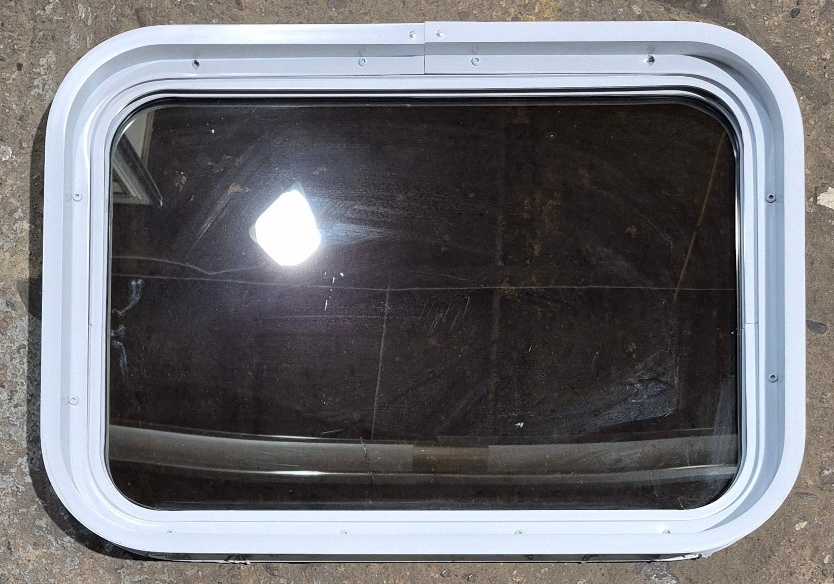 Used White Radius Non Opening Window : 24 1/4" W x 16 3/4" H x 1 7/8" D - Young Farts RV Parts