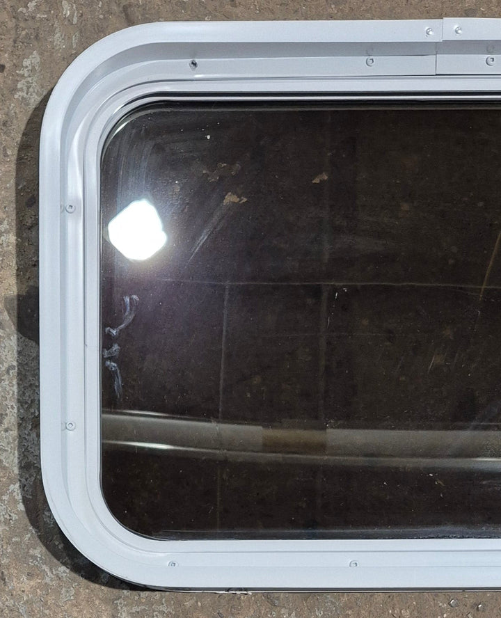 Used White Radius Non Opening Window : 24 1/4" W x 16 3/4" H x 1 7/8" D - Young Farts RV Parts