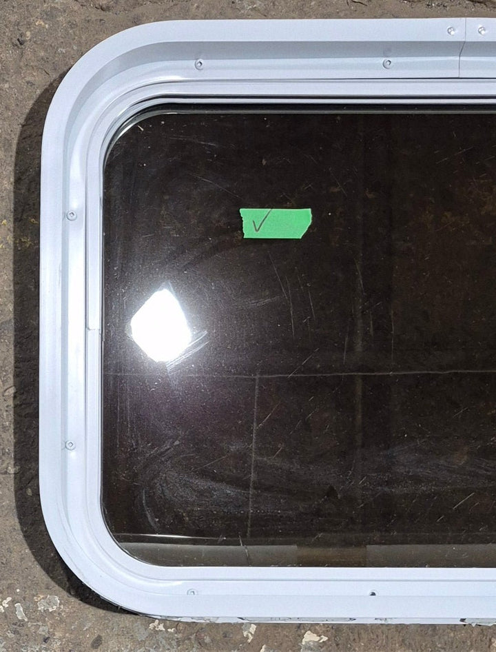 Used White Radius Non Opening Window : 24 1/4" W x 16 3/4" H x 1 7/8" D - Young Farts RV Parts