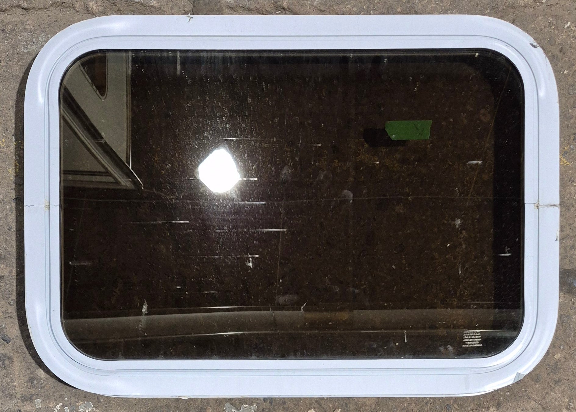 Used White Radius Non Opening Window : 24 1/4" W x 16 3/4" H x 1 7/8" D - Young Farts RV Parts