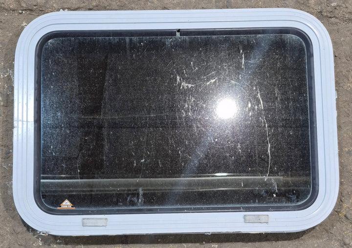 Used White Radius Non Opening Window : 24" W x 16 1/2" H x 1 7/8" D - Young Farts RV Parts