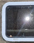 Used White Radius Non Opening Window : 24" W x 16 1/2" H x 1 7/8" D - Young Farts RV Parts