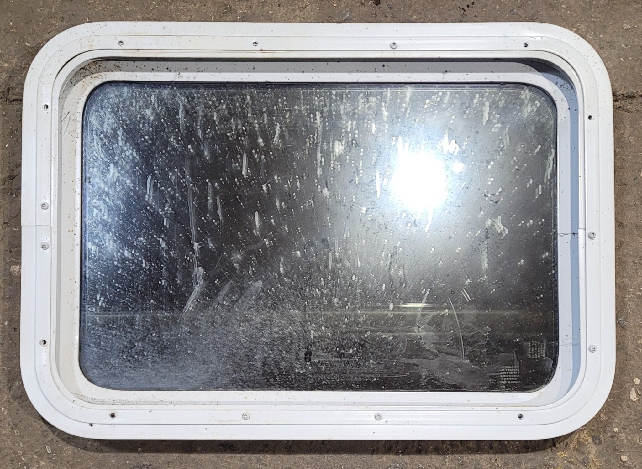 Used White Radius Non Opening Window : 24" W x 16 1/2" H x 1 7/8" D - Young Farts RV Parts