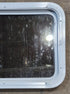 Used White Radius Non Opening Window : 24" W x 16 1/2" H x 1 7/8" D - Young Farts RV Parts
