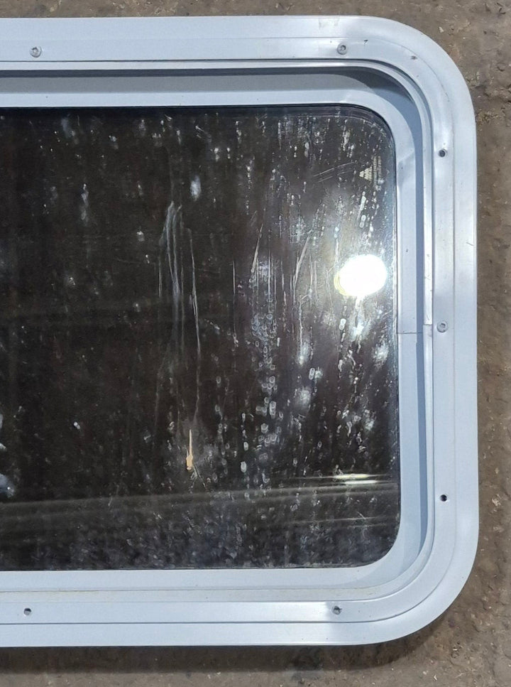 Used White Radius Non Opening Window : 24" W x 16 1/2" H x 1 7/8" D - Young Farts RV Parts