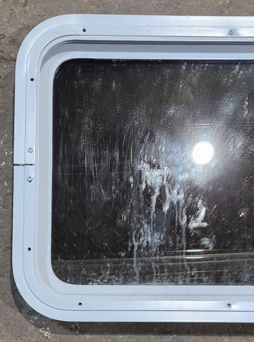 Used White Radius Non Opening Window : 24" W x 16 1/2" H x 1 7/8" D - Young Farts RV Parts