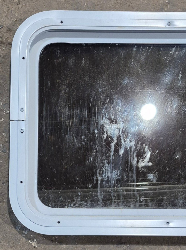 Used White Radius Non Opening Window : 24" W x 16 1/2" H x 1 7/8" D - Young Farts RV Parts