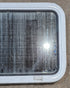 Used White Radius Non Opening Window : 24" W x 16 1/2" H x 1 7/8" D - Young Farts RV Parts