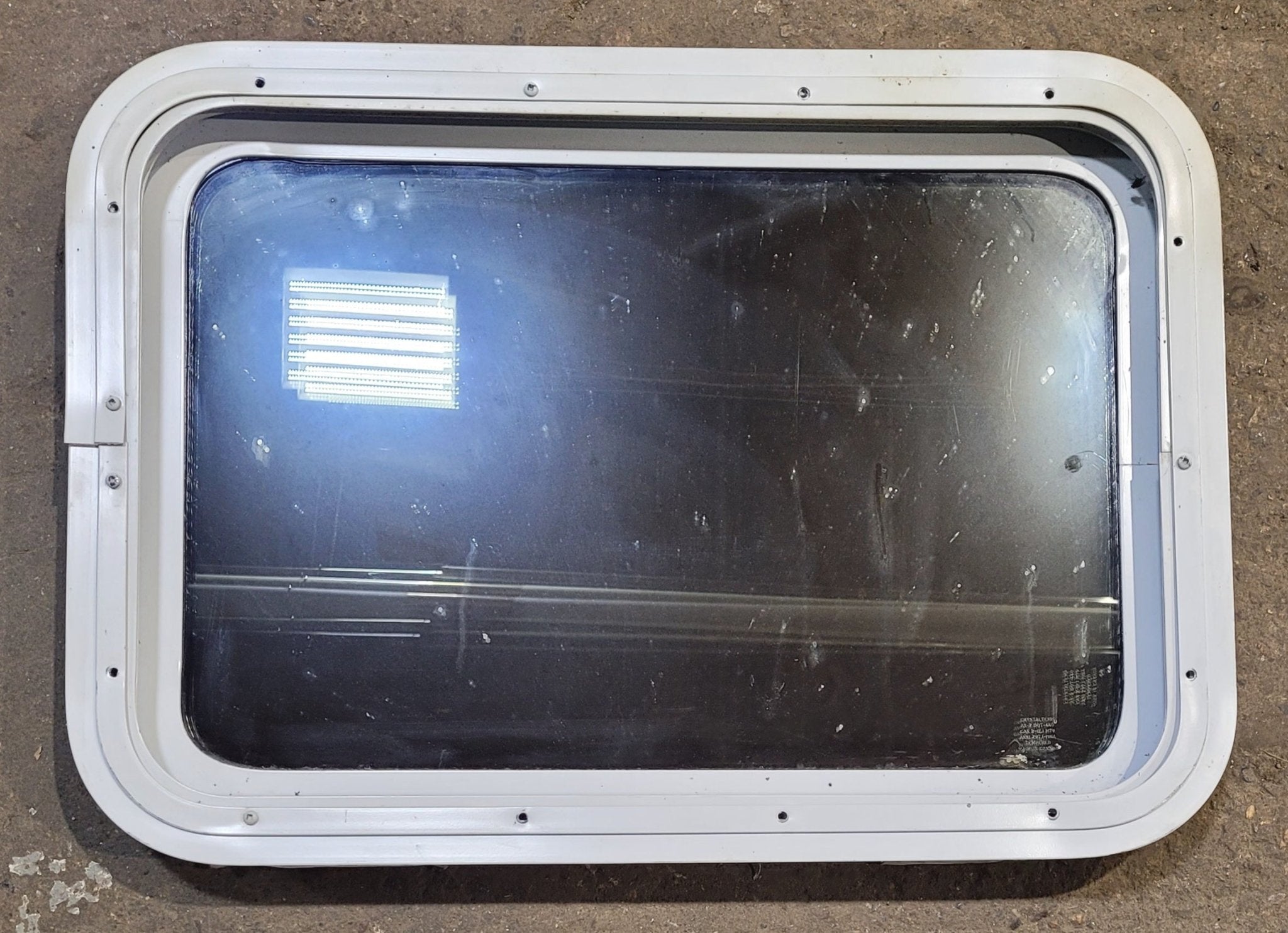 Used White Radius Non Opening Window : 24" W x 16 1/2" H x 1 7/8" D - Young Farts RV Parts