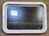 Used White Radius Non Opening Window : 24" W x 16 1/2" H x 1 7/8" D - Young Farts RV Parts