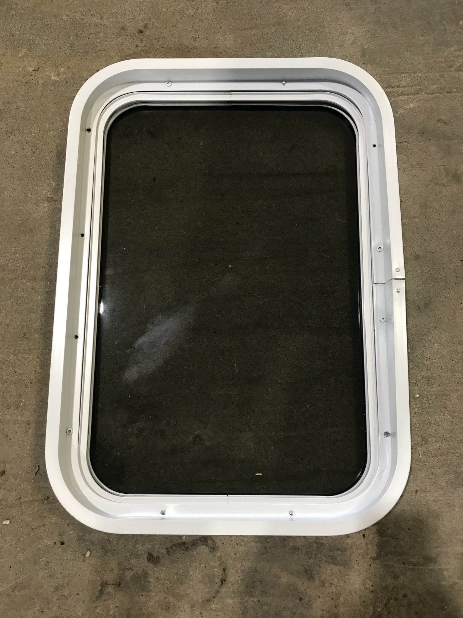 Used White Radius Non Opening Window : 24" W x 16 1/2" H x 2" D - Young Farts RV Parts