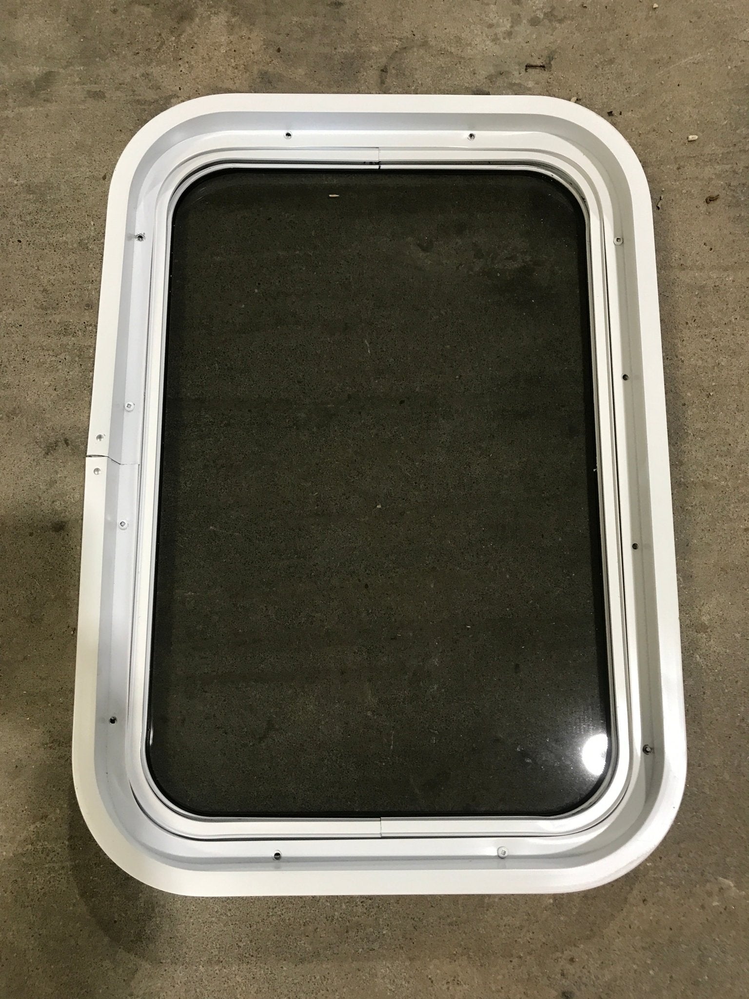 Used White Radius Non Opening Window : 24" W x 16 1/2" H x 2" D - Young Farts RV Parts