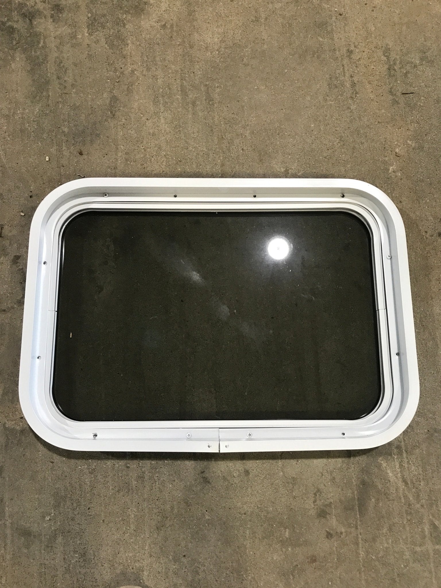 Used White Radius Non Opening Window : 24" W x 16 1/2" H x 2" D - Young Farts RV Parts