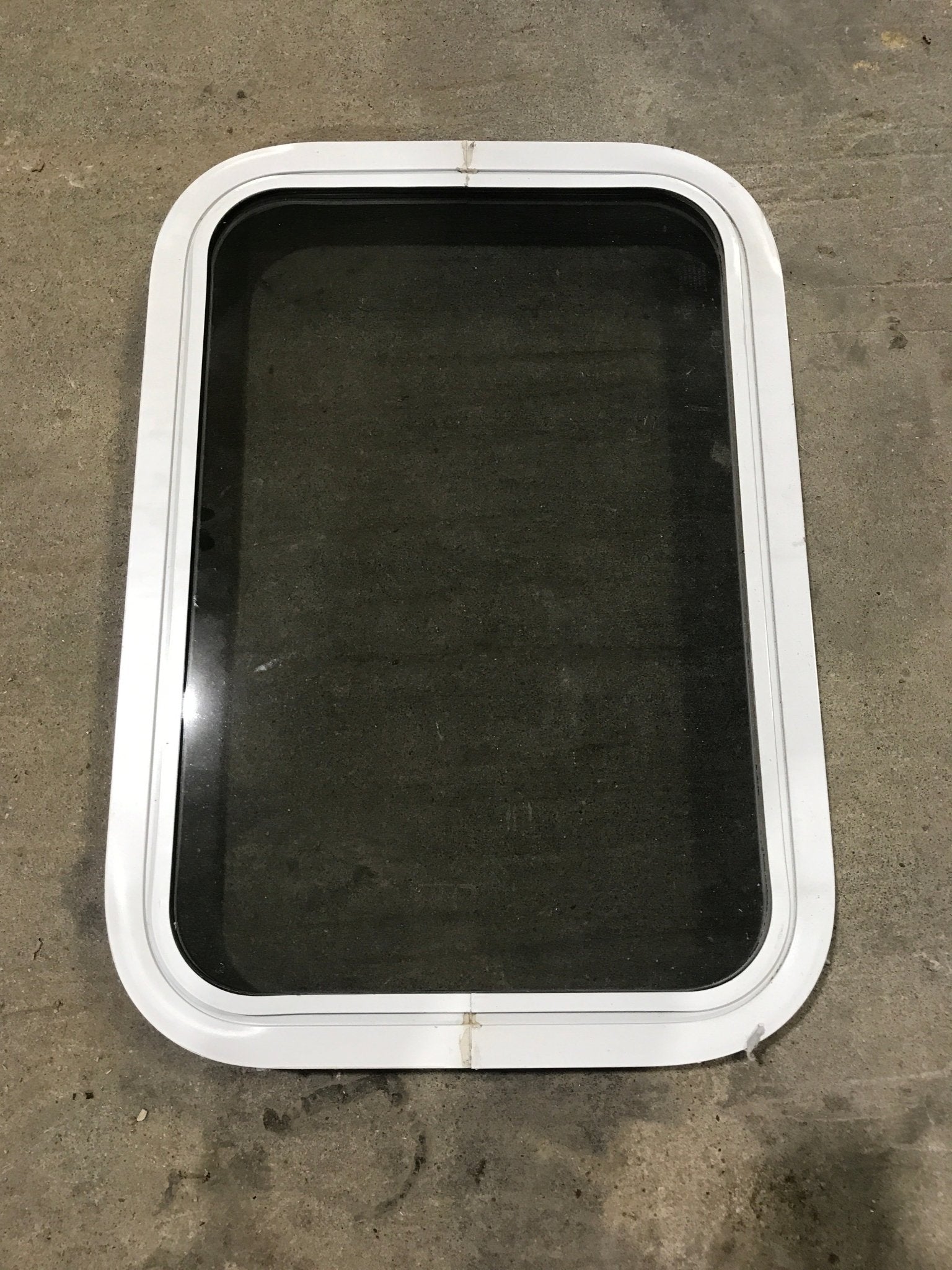 Used White Radius Non Opening Window : 24" W x 16 1/2" H x 2" D - Young Farts RV Parts