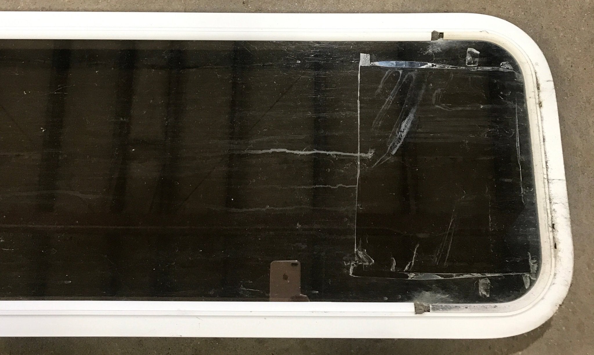 Used White Radius Non Opening Window : 45 1/2" W x 15 1/2" H x 1 7/8" D - Young Farts RV Parts