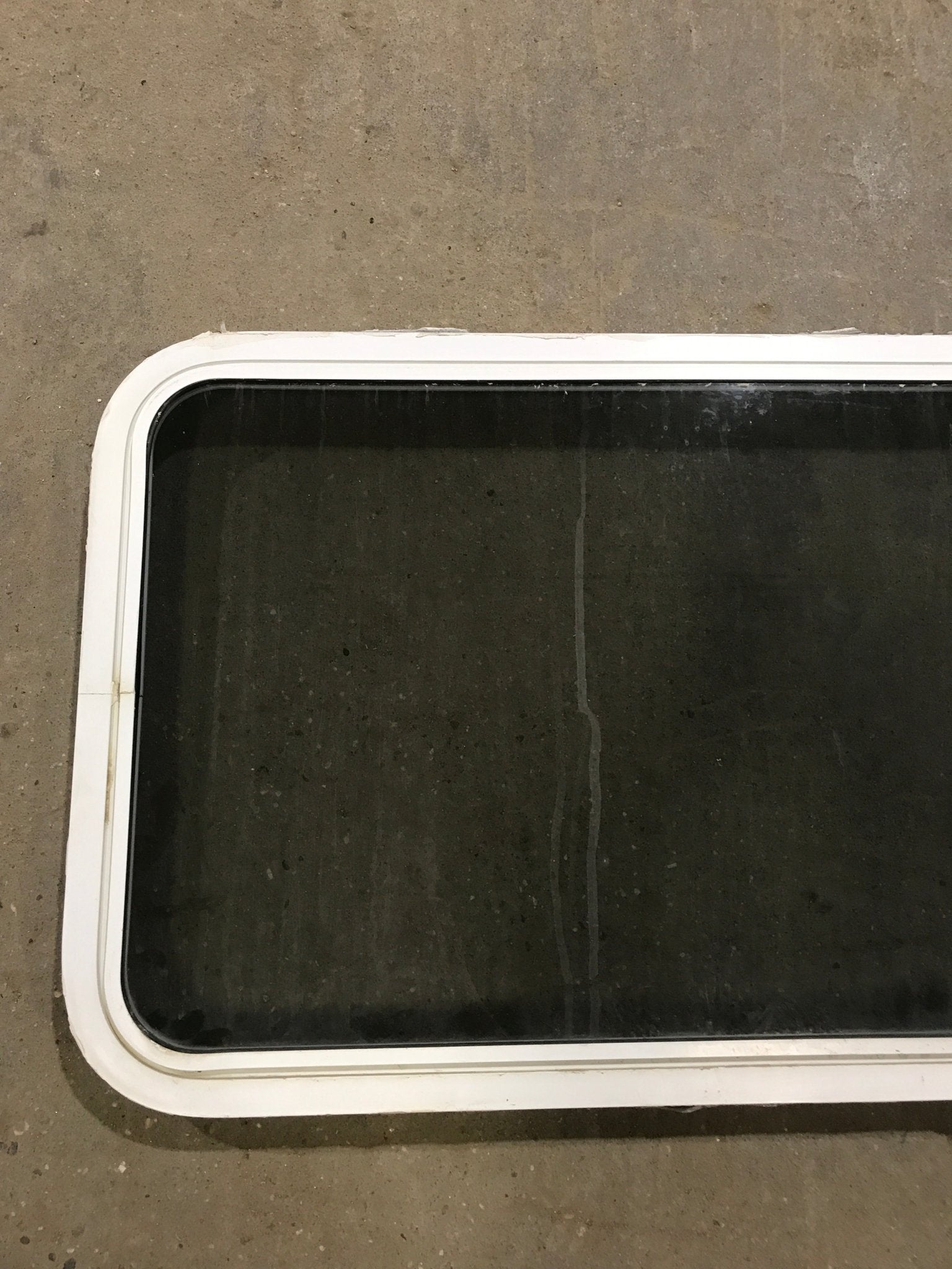 Used White Radius Non Opening Window : 47 3/4" W x 21 1/2" H x 2" D - Young Farts RV Parts