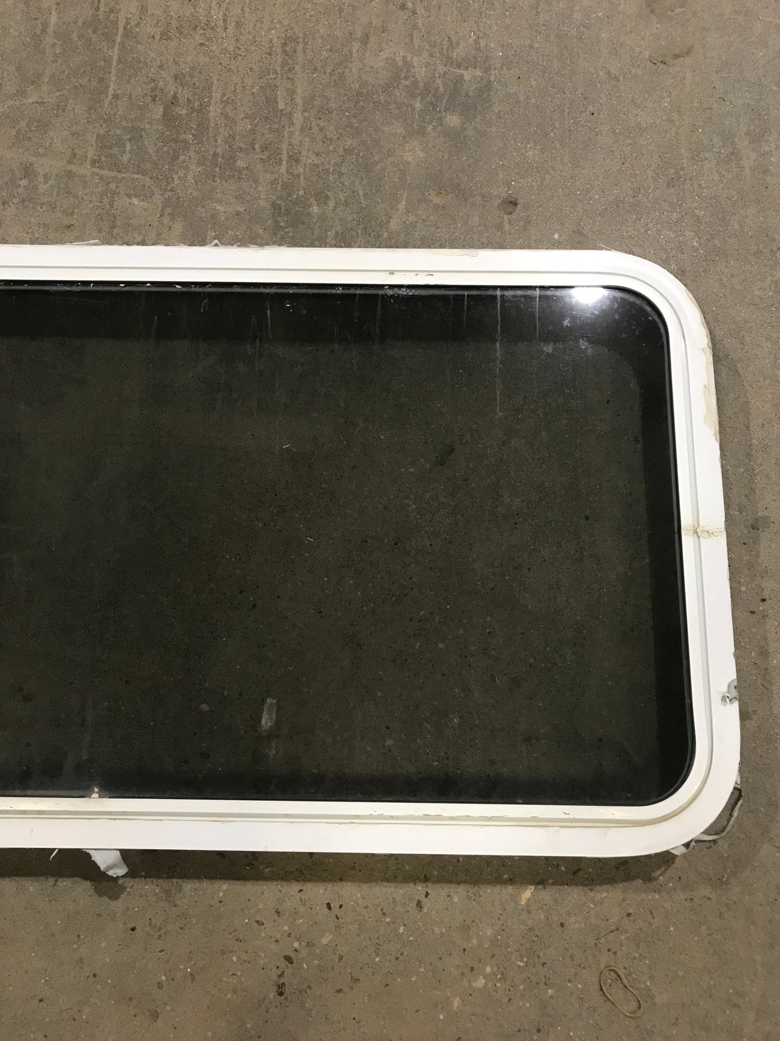 Used White Radius Non Opening Window : 47 3/4" W x 21 1/2" H x 2" D - Young Farts RV Parts
