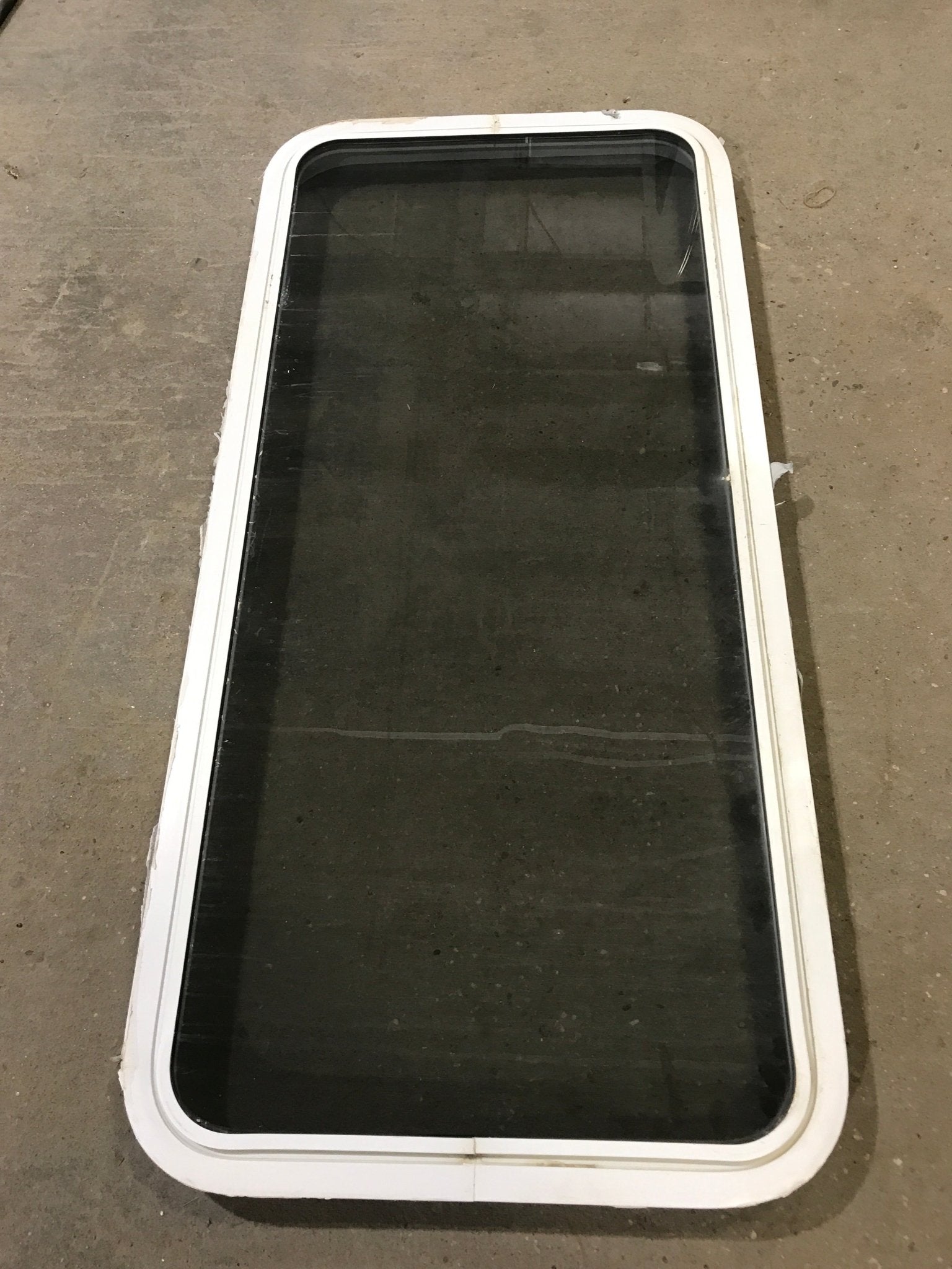 Used White Radius Non Opening Window : 47 3/4" W x 21 1/2" H x 2" D - Young Farts RV Parts
