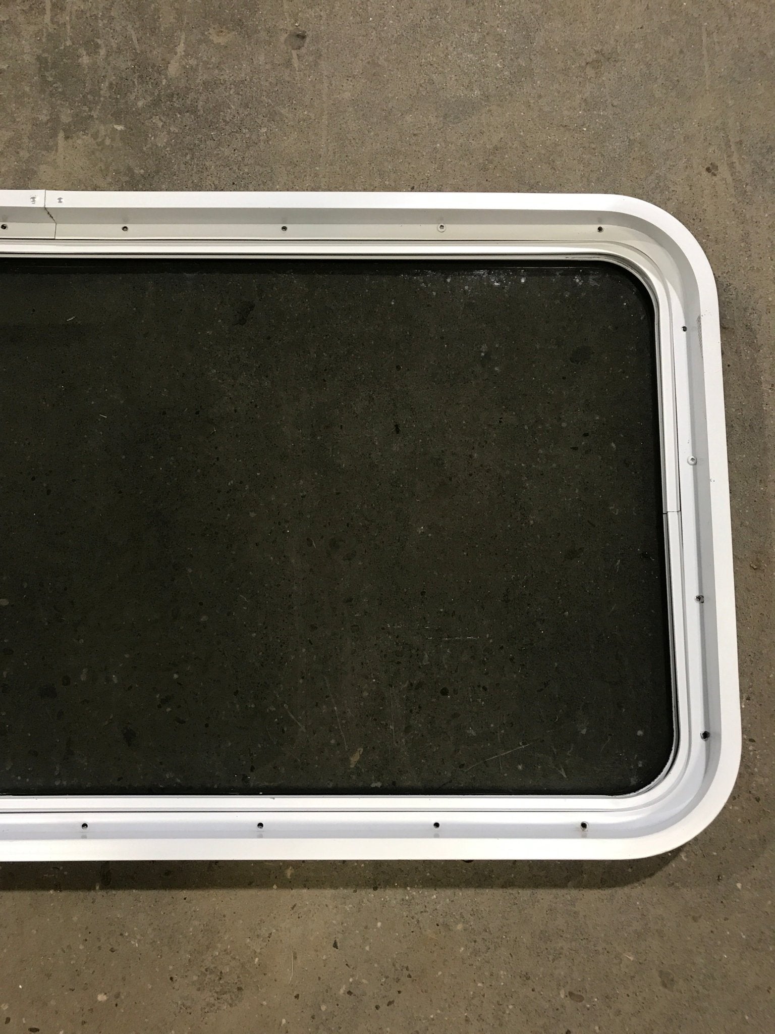 Used White Radius Non Opening Window : 47 3/4" W x 21 1/2" H x 2" D - Young Farts RV Parts