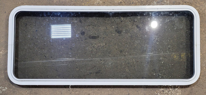 Used White Radius Non Opening Window : 54 1/4" W x 21 3/4" H x 1 7/8" D - Young Farts RV Parts