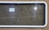 Used White Radius Non Opening Window : 54 1/4" W x 21 3/4" H x 1 7/8" D - Young Farts RV Parts
