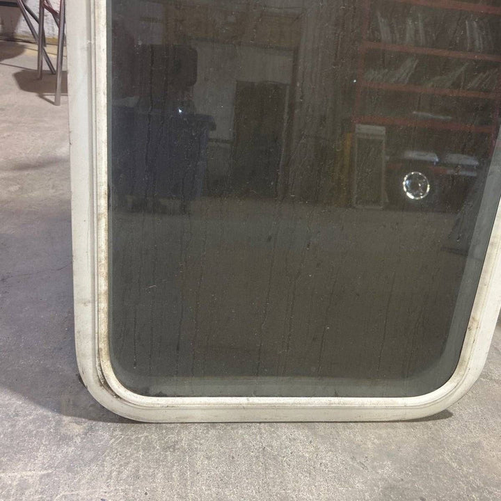 Used White Radius Non Opening Window - 59.5 X 21.5 X 2.25 - Young Farts RV Parts